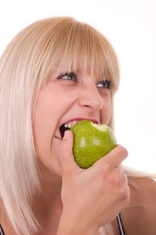 Girl Biting The Apple Royalty Free Stock Photography