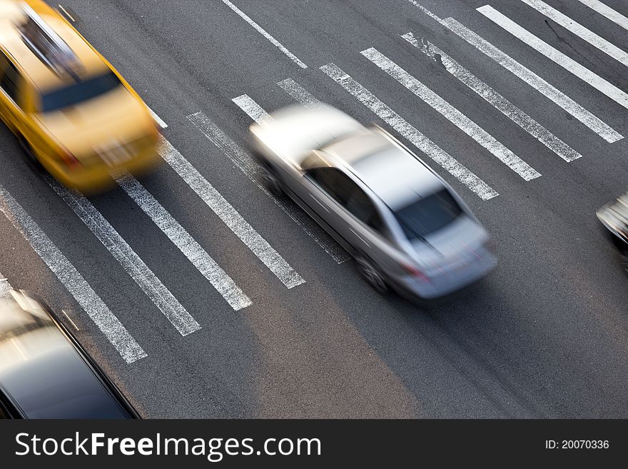 Traffic of New York traversing a zebra crossing. Traffic of New York traversing a zebra crossing