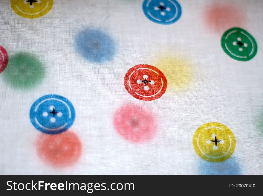 Colorful fastener on the white cloth