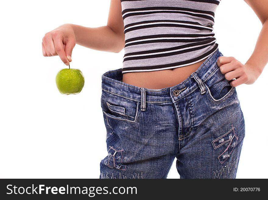 Young healthy woman holding green apple. Young healthy woman holding green apple