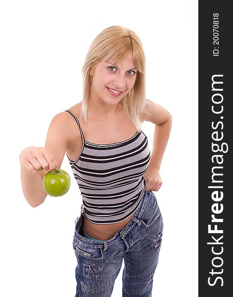 Young healthy woman holds green apple isolated. Young healthy woman holds green apple isolated