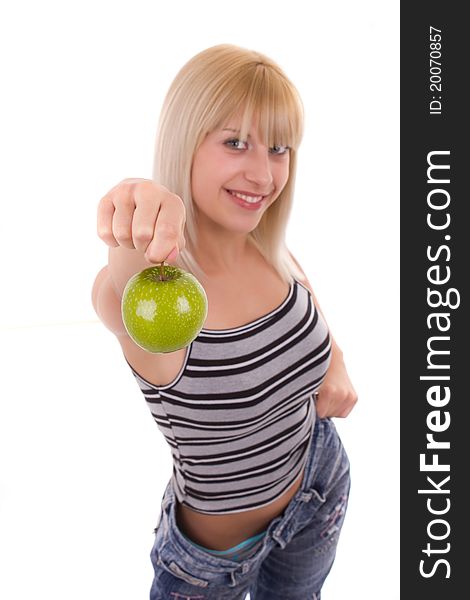 Woman holds green apple isolated on white background