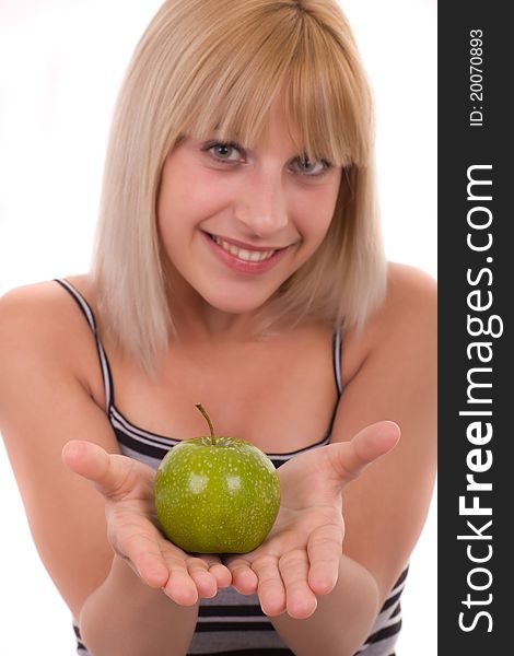 Woman holds green apple isolated. Woman holds green apple isolated