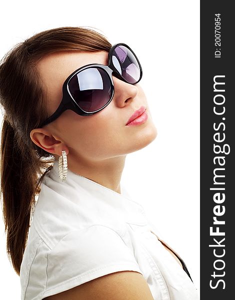 Girl in sunglasses isolated on white