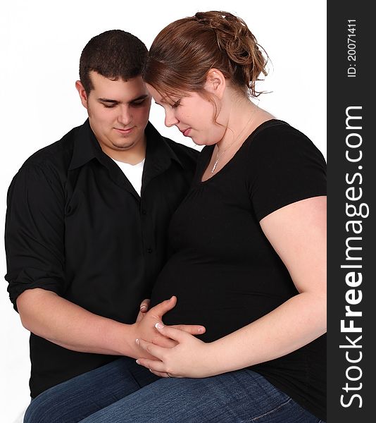 Couple Holding Woman S Pregnant Stomach. Isolated