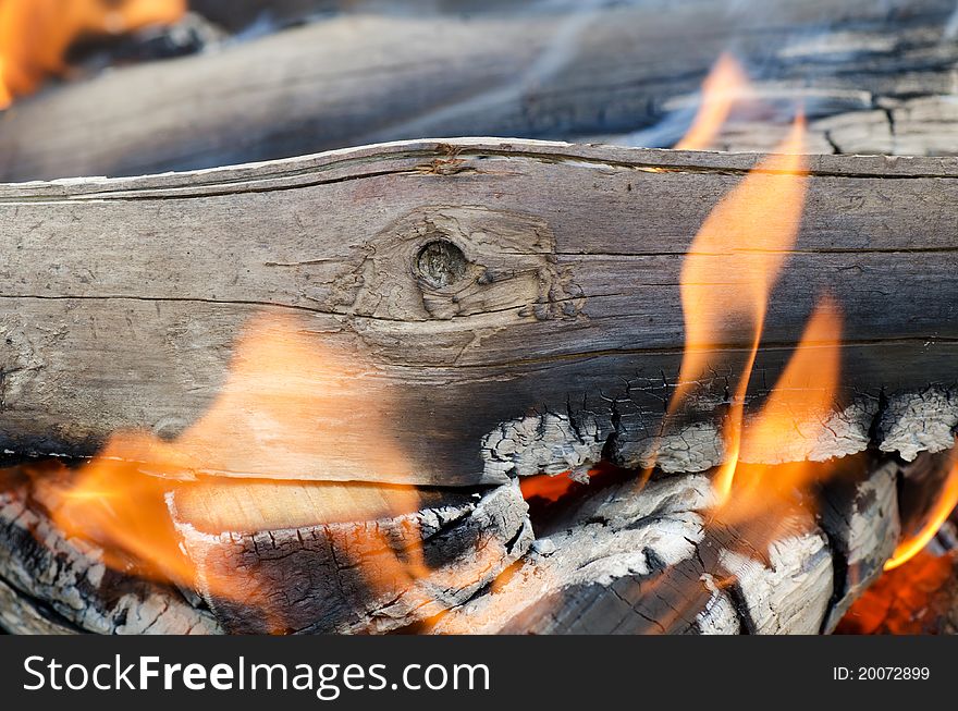 Very hot campfire close up a background