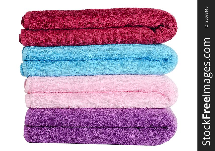 The combined colour towels isolated on white