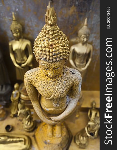 Gold Buddha statue in  Sangkhlaburi /Kanchanaburi/ thailand.