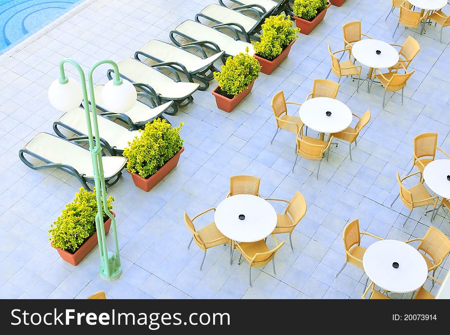 Empty caffee near the swiming pool in the summer