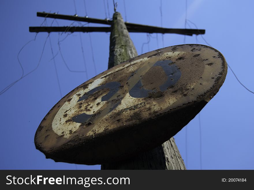 Old speed limit sign