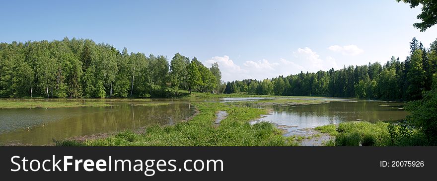 Beautiful view down the valley of the River Vorya near  Abramtsevo Museum (Moscow region), Russia in sunny summer day. Beautiful view down the valley of the River Vorya near  Abramtsevo Museum (Moscow region), Russia in sunny summer day