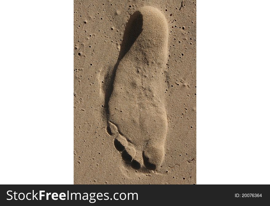 Single footprint on white beach sand. Single footprint on white beach sand.