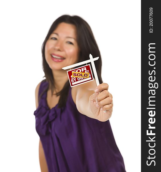 Attractive Multiethnic Woman Holding Small Sold For Sale By Owner Real Estate Sign in Hand Isolated on White Background. Attractive Multiethnic Woman Holding Small Sold For Sale By Owner Real Estate Sign in Hand Isolated on White Background.