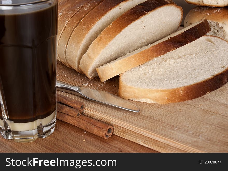 Sliced White Bread Loaf & Coffee In A Thumbler