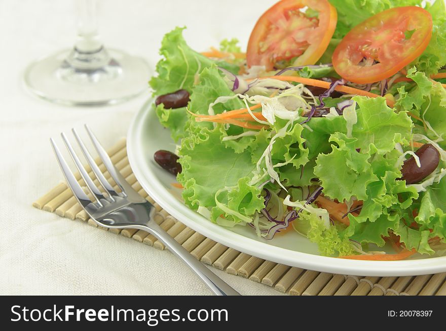 Fresh salad on diner table