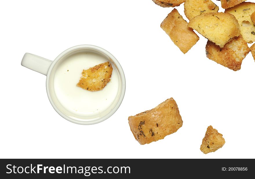 Closeup of delicious bread croutons and milk