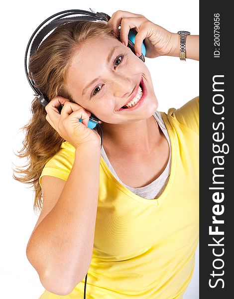 Attractive girl enjoying music with dj headphones.
