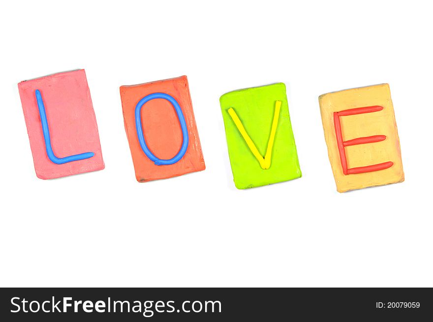 Clay letters. Words LOVE isolated on the white background