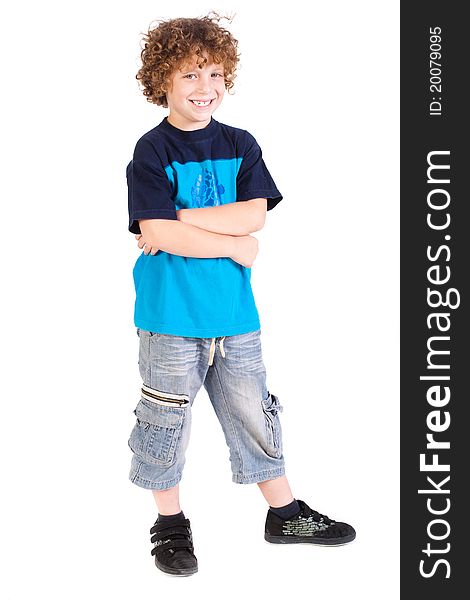 Young preschool boy posing with arms crossed isolated on white background. Young preschool boy posing with arms crossed isolated on white background...