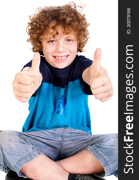 Young kid smailing at camera and showing double thumbs up isolated on white. Young kid smailing at camera and showing double thumbs up isolated on white.