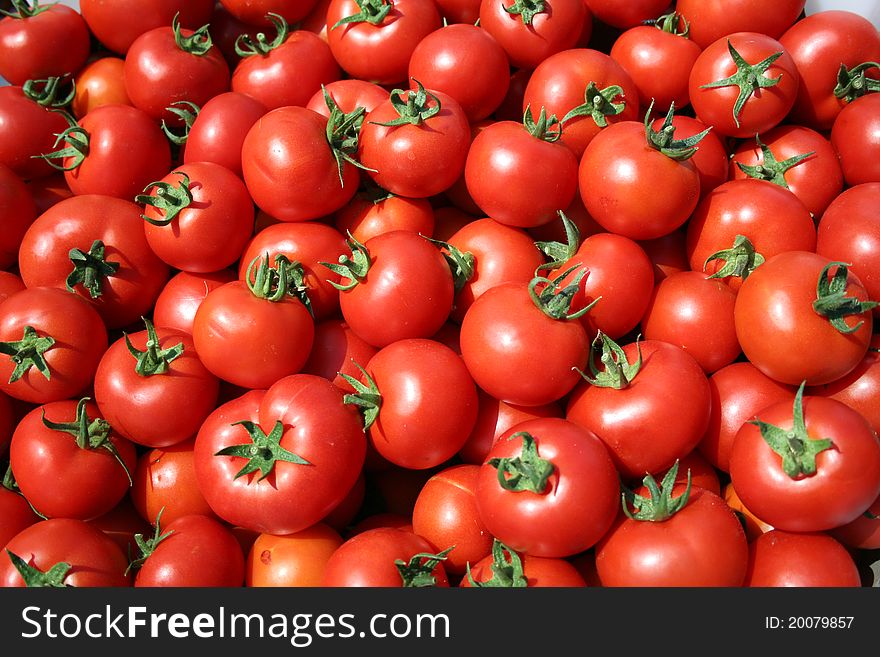 Ripe tomatoes for sale at market. Ripe tomatoes for sale at market