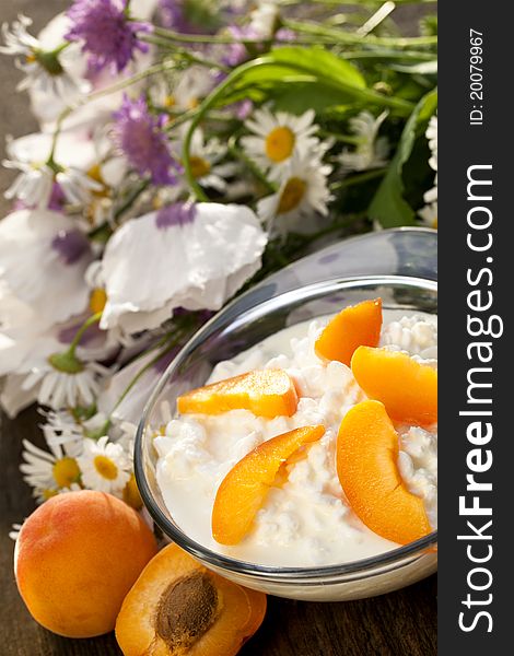 Cottage cheese with bits of apricot fruit