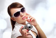 Young Stylish Woman With A Camera Royalty Free Stock Photos Young Stylish Woman With A Camera Royalty Free Stock Photos