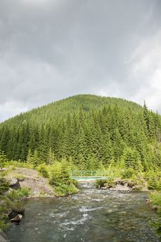 Clear Mountain Brook And Bridge Crossing Royalty Free Stock Image Clear Mountain Brook And Bridge Crossing Royalty Free Stock Image