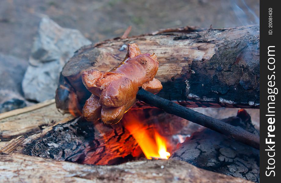 Sausage On Campfire