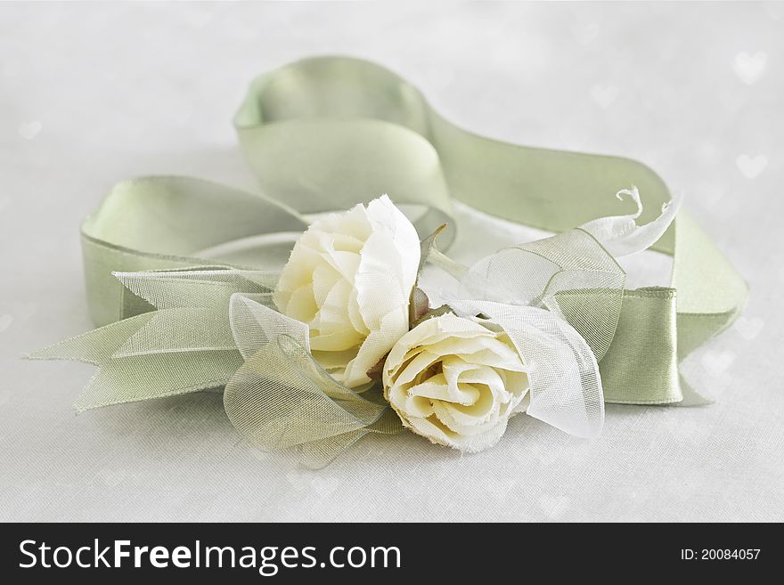 Soft roses with satin and voile ribbon with heart texture . Shallow DOF. Soft roses with satin and voile ribbon with heart texture . Shallow DOF