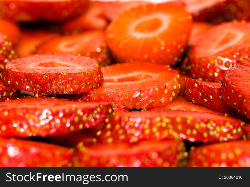 Mature strawberry which was cut on a part (small depth of sharpness). Mature strawberry which was cut on a part (small depth of sharpness)