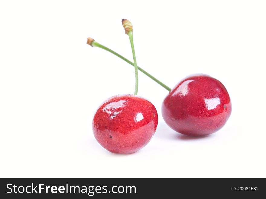 Red ripe cherries isolated on a white background