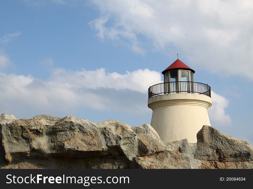 Lighthouse with blue sky background