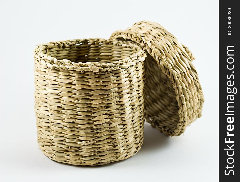 Wicker basket used for storing jewelry or something similar