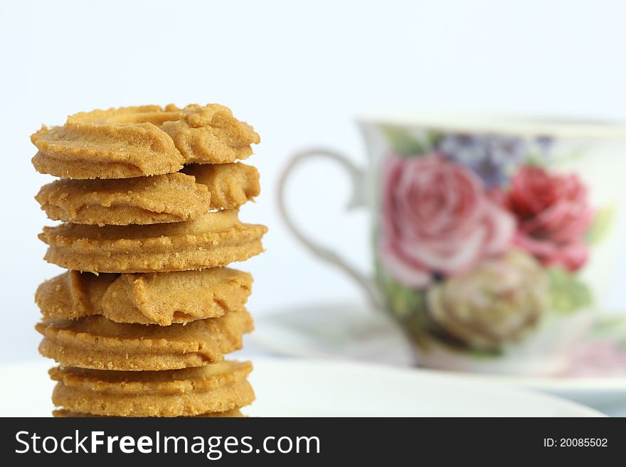 Cookies and coffee morning refreshments on white background