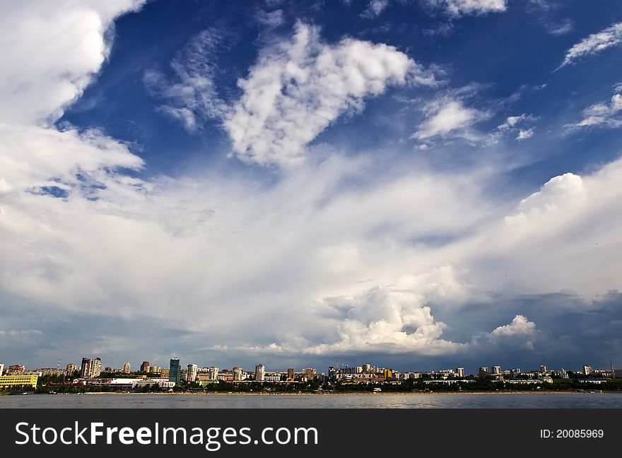 Sky with storm clouds over the port city. Samara, Russia. City Quay and beaches.