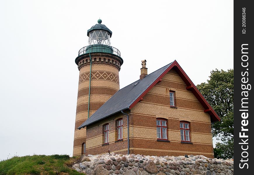 Lighthouse in classical design taken in a low angle