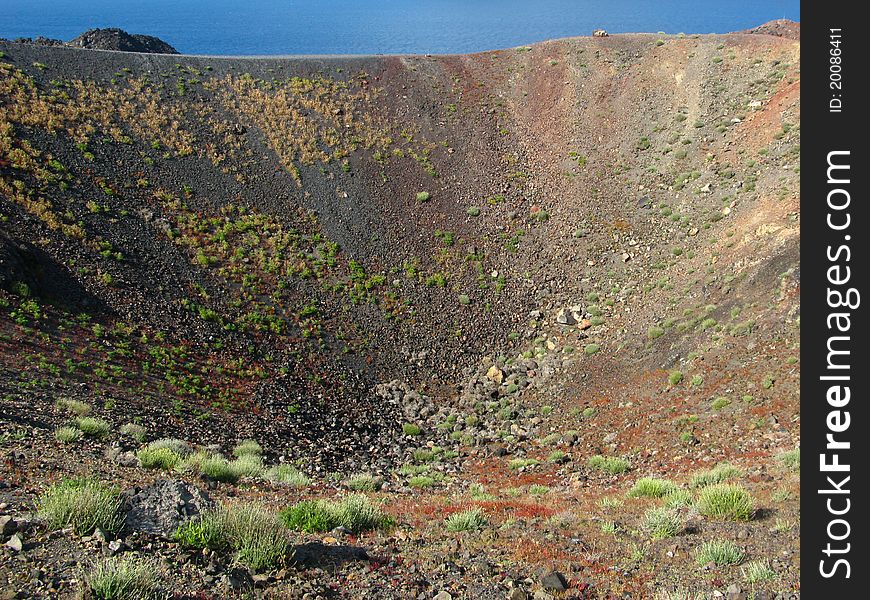 Thirasia Island volcano in Santorini in Greece in the Mediterranean Sea. Thirasia Island volcano in Santorini in Greece in the Mediterranean Sea.