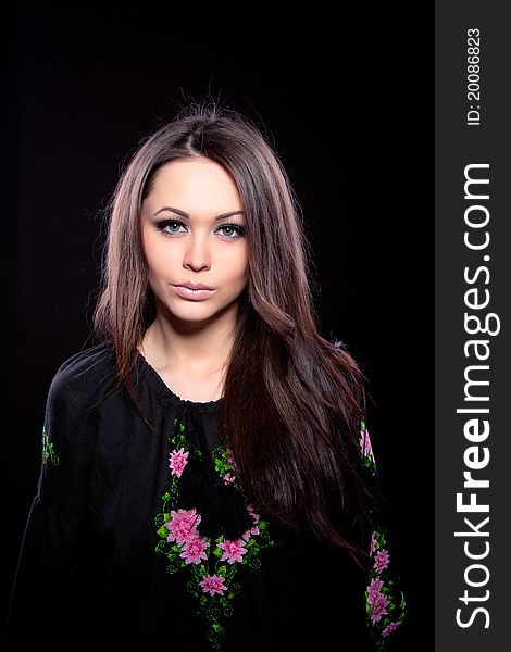 Portrait of a beautiful attractive girl on black background. Portrait of a beautiful attractive girl on black background