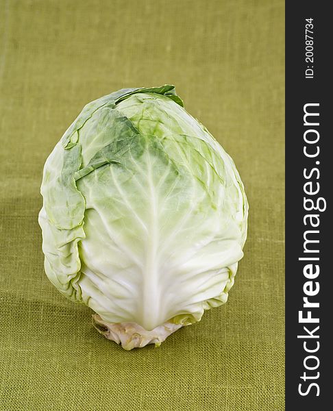 A beautiful cabbage isolated on green