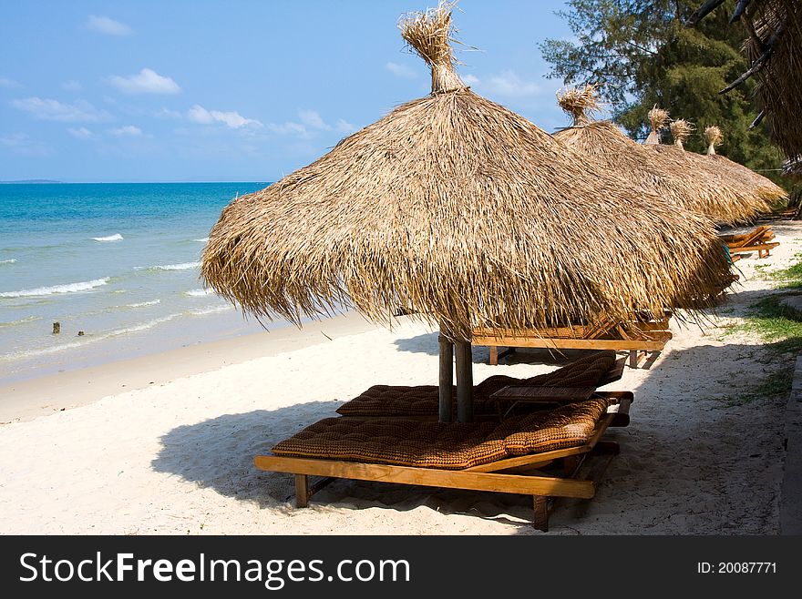 Beach umbrellas at the beach. Beach umbrellas at the beach