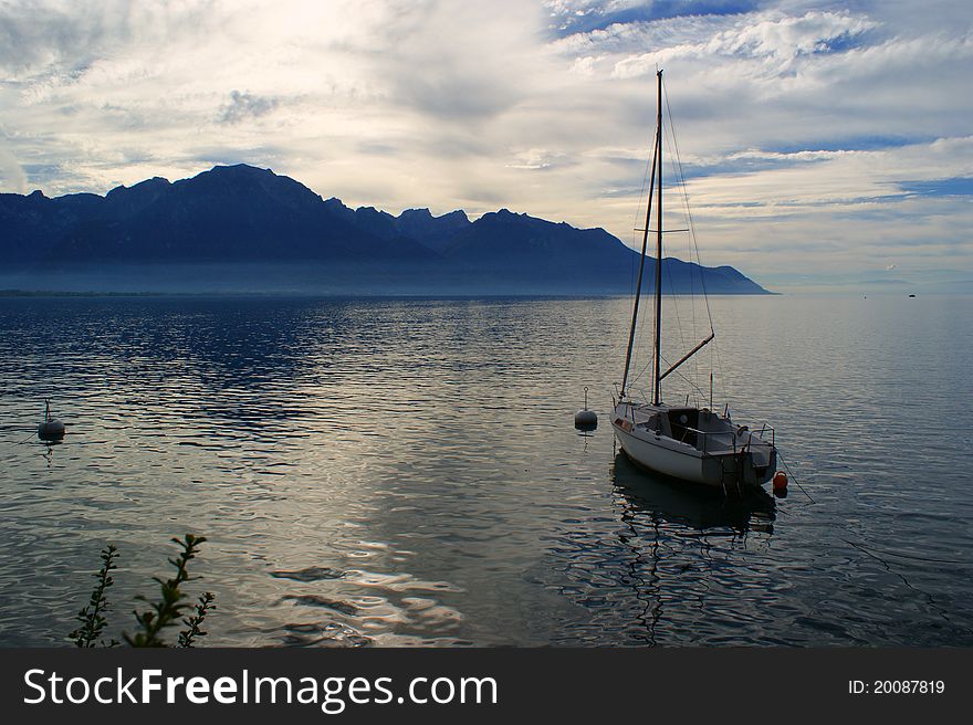 The yacht on lake of Geneva, the Decline over lake. The yacht on lake of Geneva, the Decline over lake