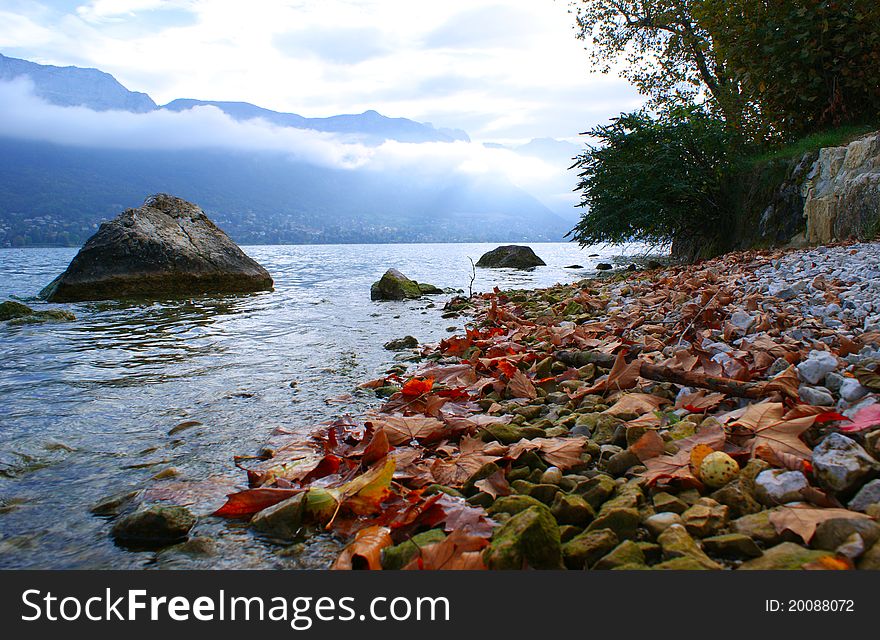 Autumn on lake, the French Alpes, the Alpine lake