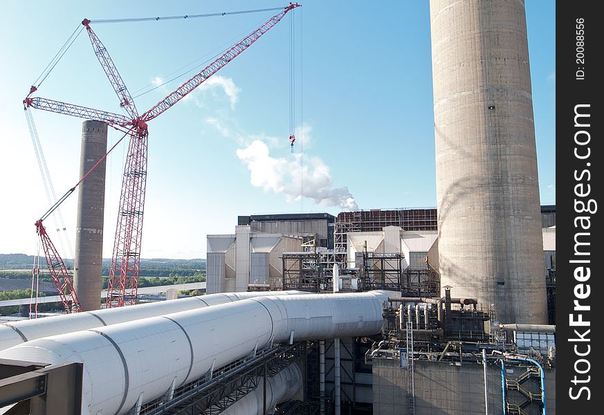 Coal fired power station with crane on site for maintenance projects