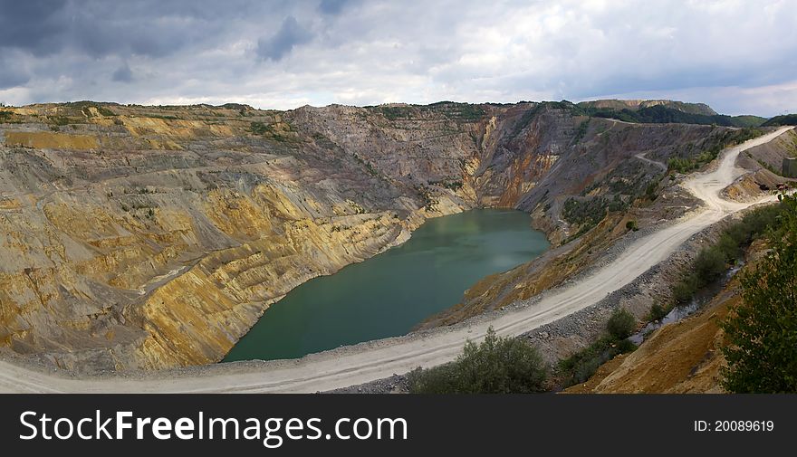 Open pit on copper mine and artificial lake. Open pit on copper mine and artificial lake.