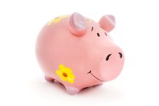 Pink Piggy Bank With Yellow Flowers Royalty Free Stock Photography