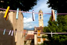 Clothes Pegs On Clothes Line With Church Royalty Free Stock Image