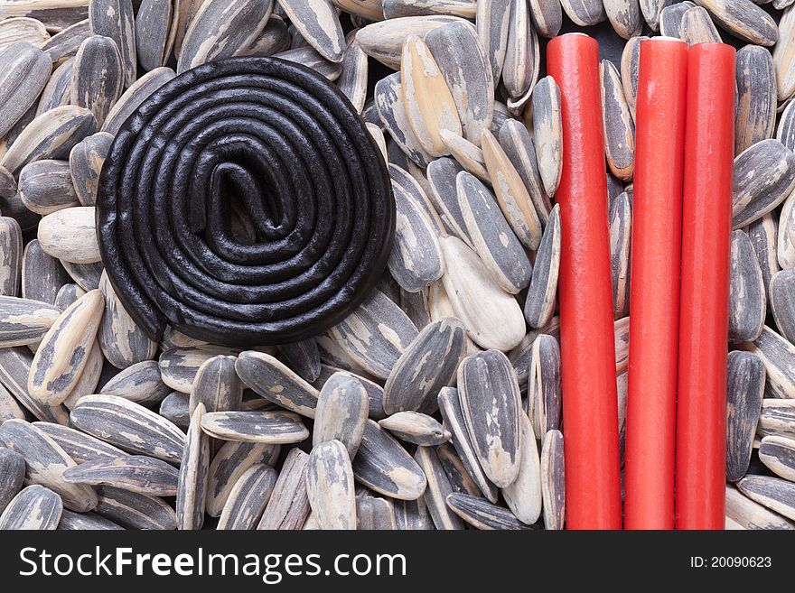 Pipes, and black and red licorice. Pipes, and black and red licorice