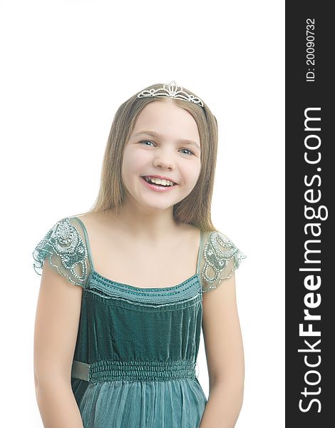 Young little kid in long dress wearing artistic crown and isolated over white background. Young little kid in long dress wearing artistic crown and isolated over white background