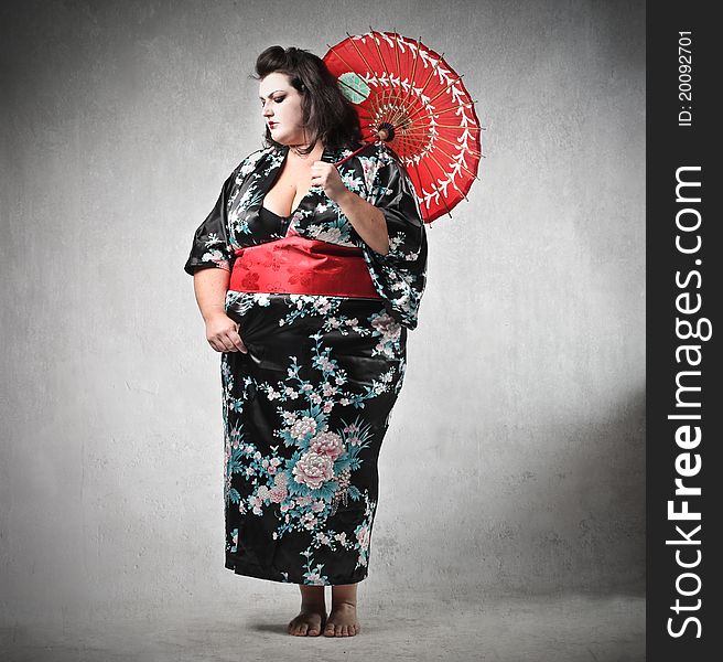 Fat woman disguised as a geisha. Fat woman disguised as a geisha